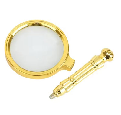 Loupe de lecture dorée