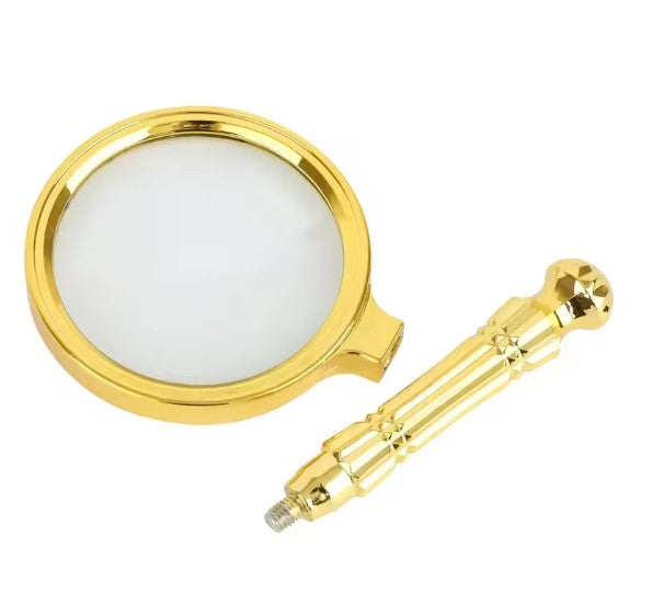 Loupe de lecture dorée