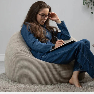 Fauteuil de lecture pouf beige